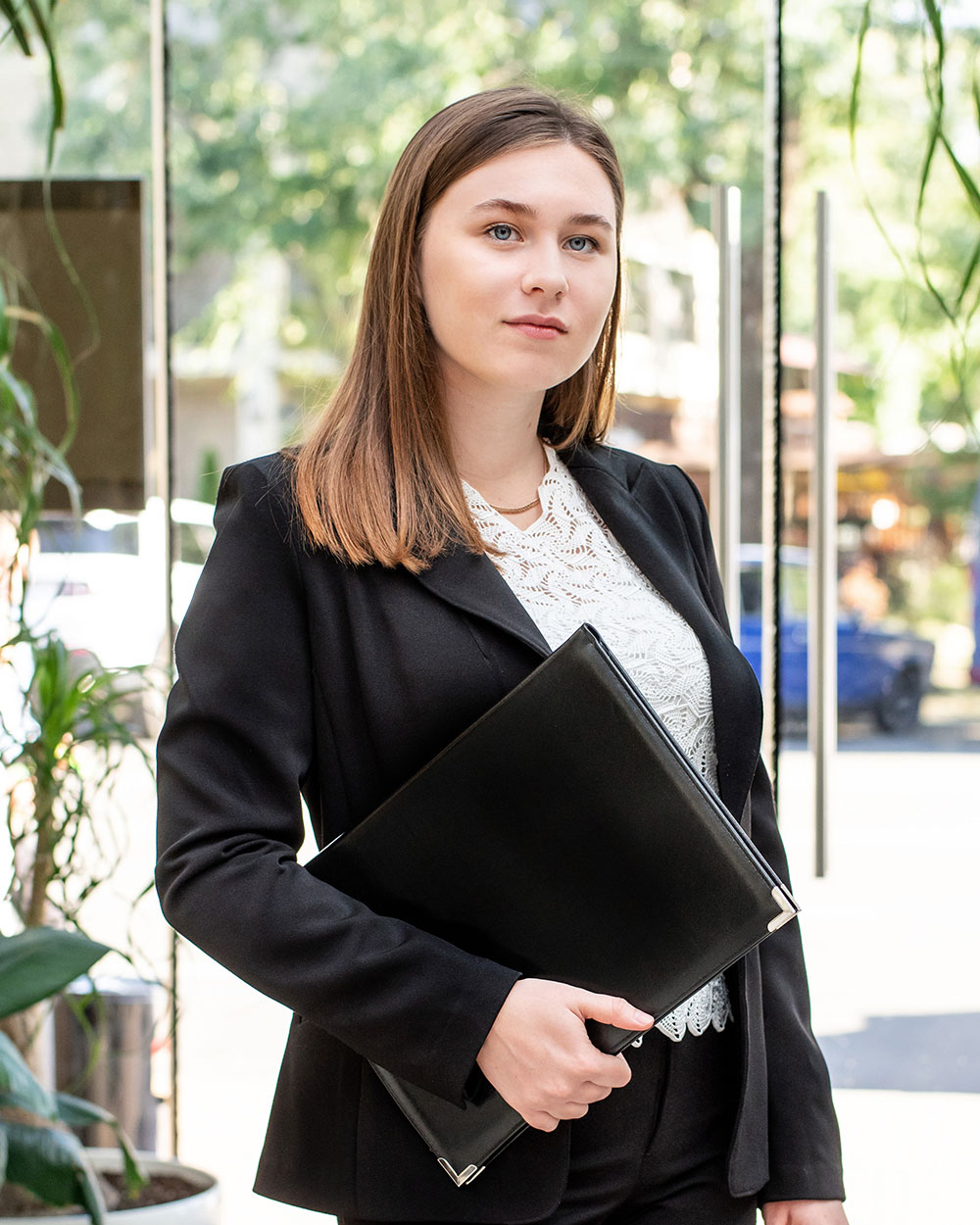 young-business-woman-in-black-suit-standing-in-the-ym4xqkm young-business-woman-in-black-suit-standing-in-the-ym4xqkm